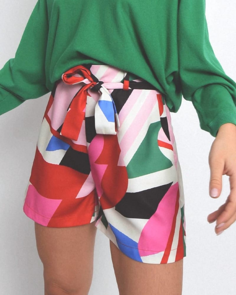 Front of a model wearing a size Large Tie Waist Geo Print Shorts In Multi in Multi by MOLLY BRACKEN. | dia_product_style_image_id:355705